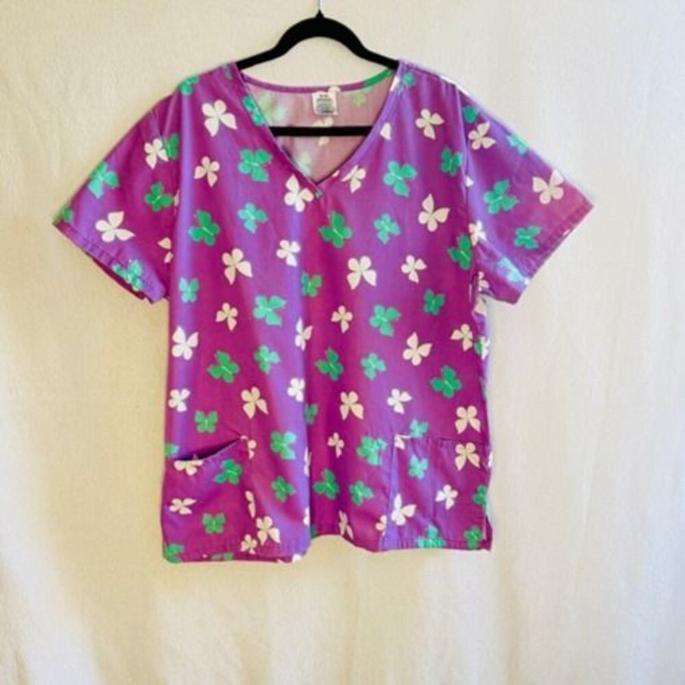 Women's purple butterfly multi-color patterned v-neck scrub top medical uniform.